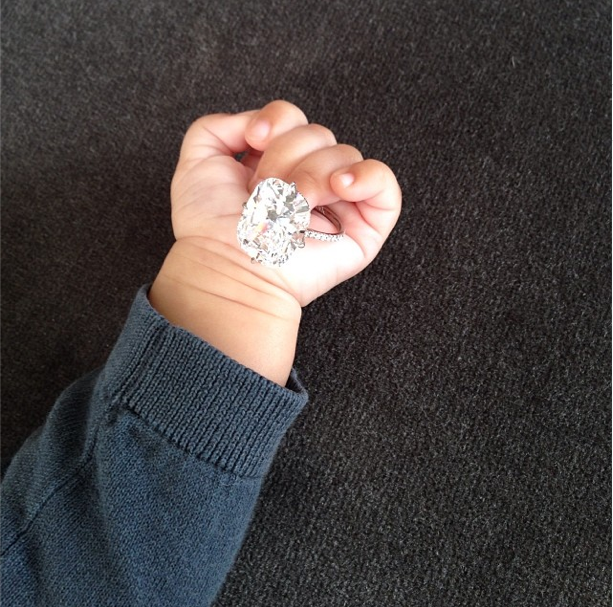 North West Holding Kim’s Ring