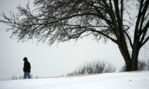 man walking in snow