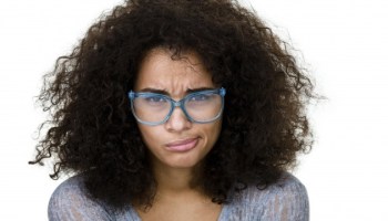 Mixed race woman with a displeased expression
