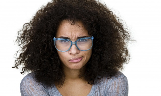 Mixed race woman with a displeased expression