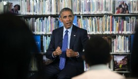Obama In A Library