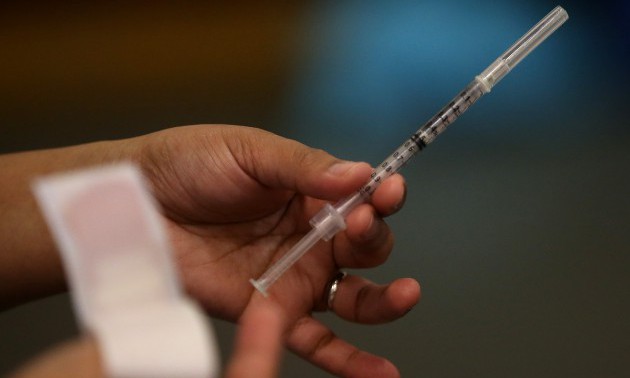 Oakland Residents Receive Free Flu Shots At Local Church