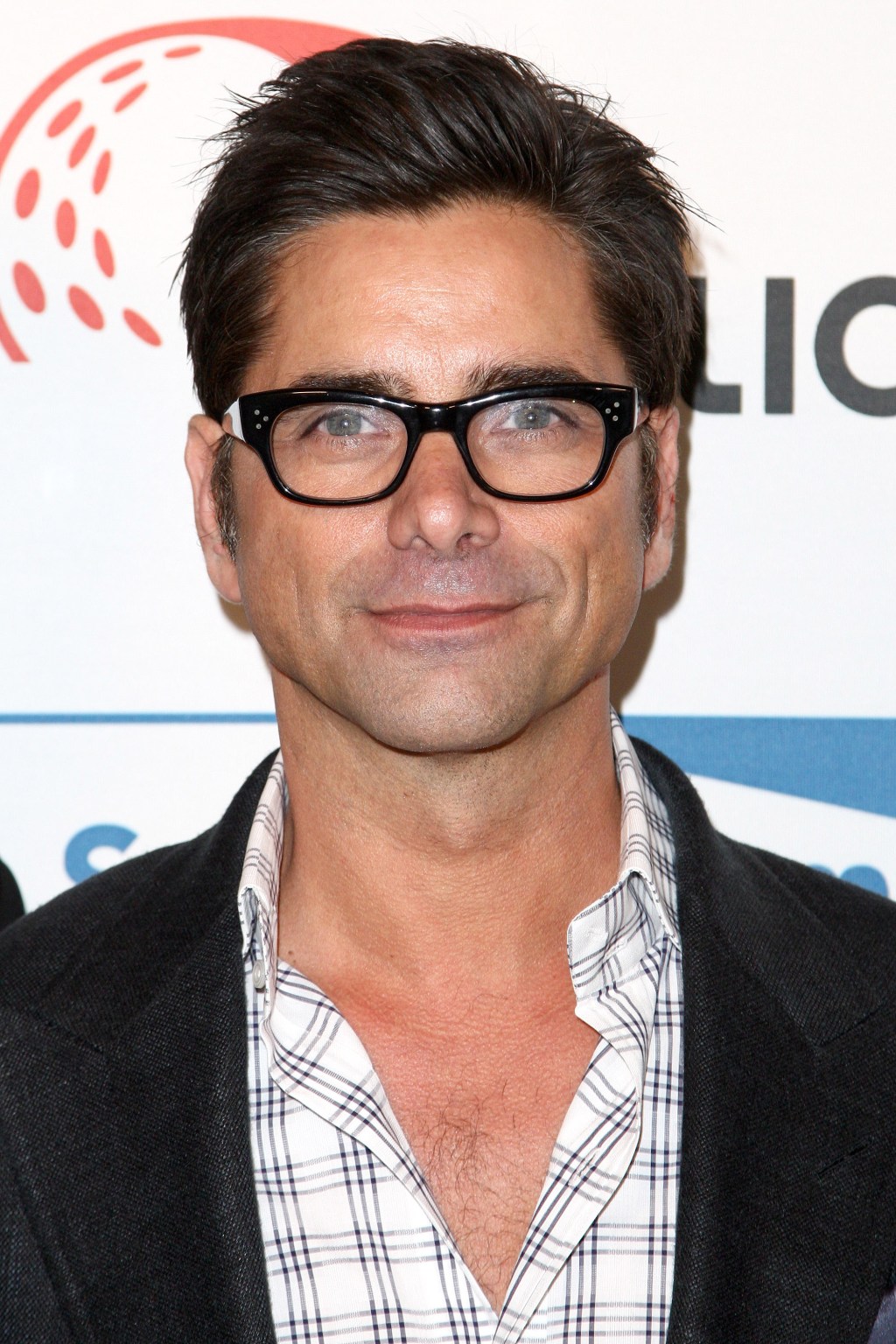 John Stamos attends the Cool Comedy Hot Cuisine Benefit June 5th in Beverly Hills