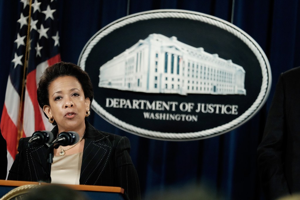 Attorney General Lynch And FBI Director Comey Hold News Conference At Justice Department