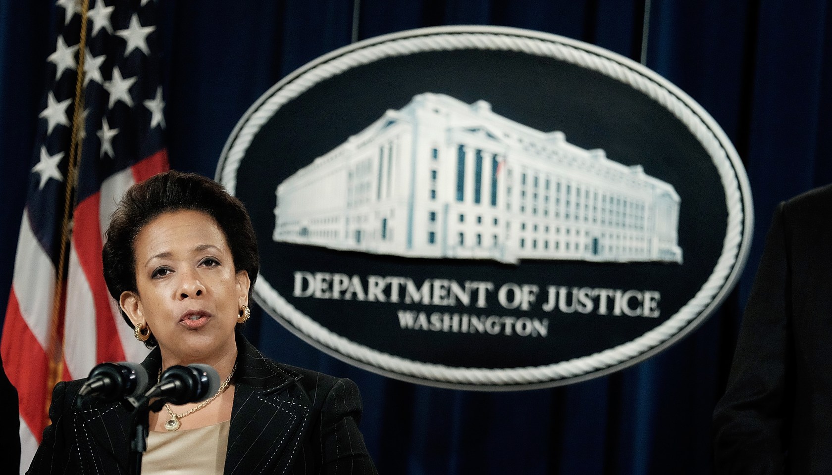 Attorney General Lynch And FBI Director Comey Hold News Conference At Justice Department