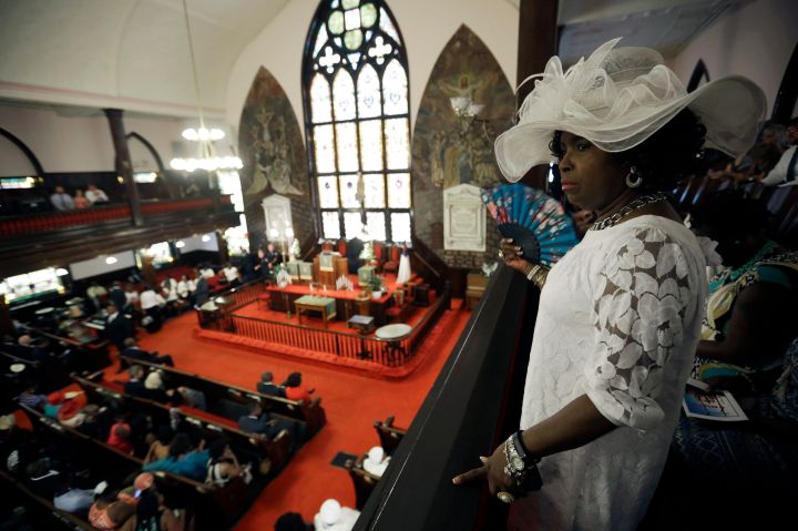 Gloria Moore watches the church