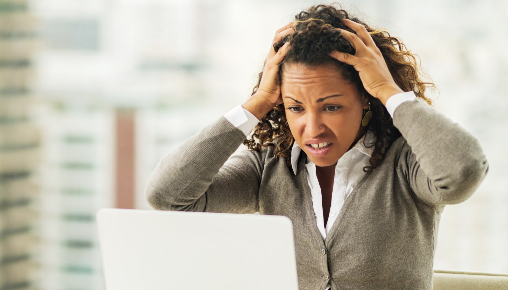 Disappointed African American businesswoman having problems with