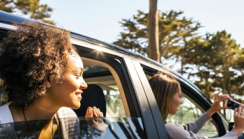 Black woman in car feature image