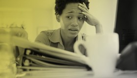 Woman Stressed At Work