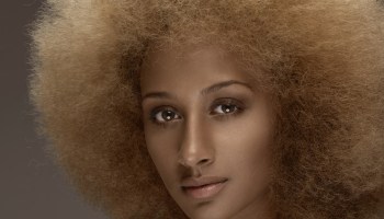 attractive young african woman with curly hair