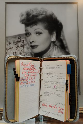 An address book and a photo of TV person