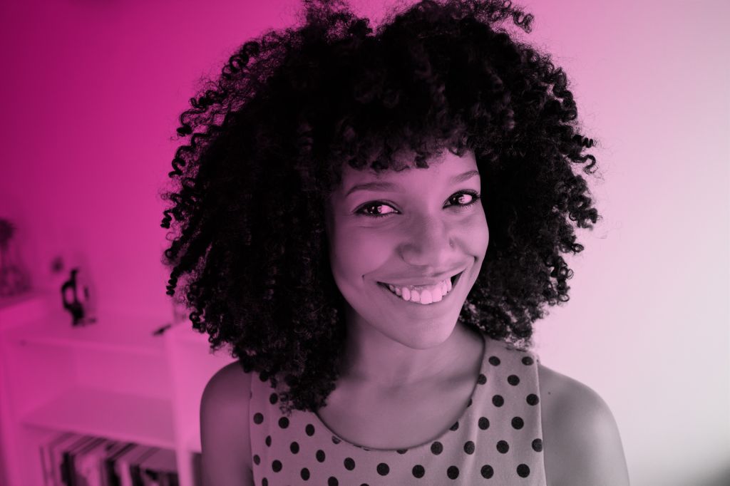 Close up of smiling face of mixed race woman