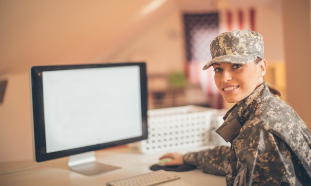 Smiling soldier in the office