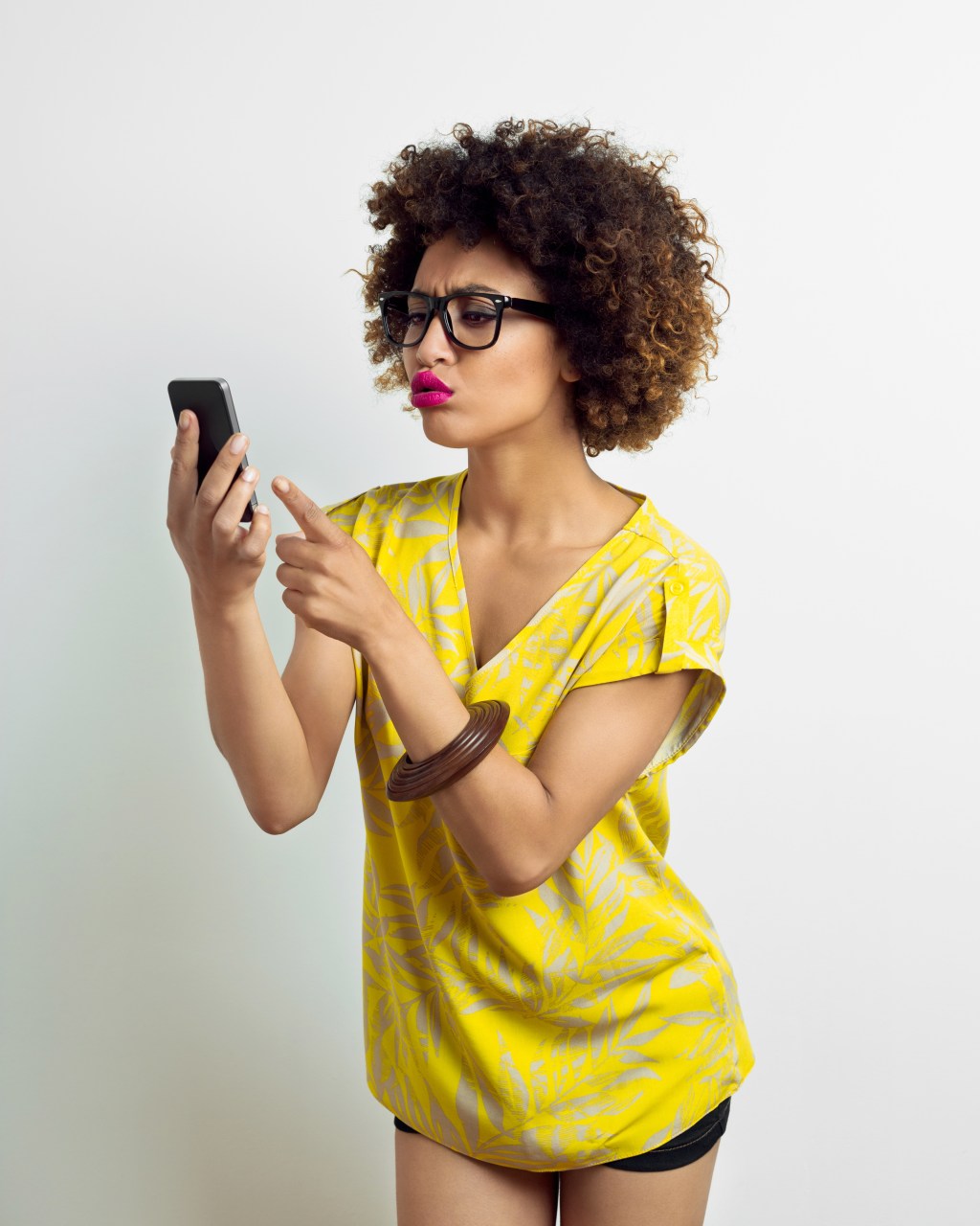 Afro American Young Woman using smart phone