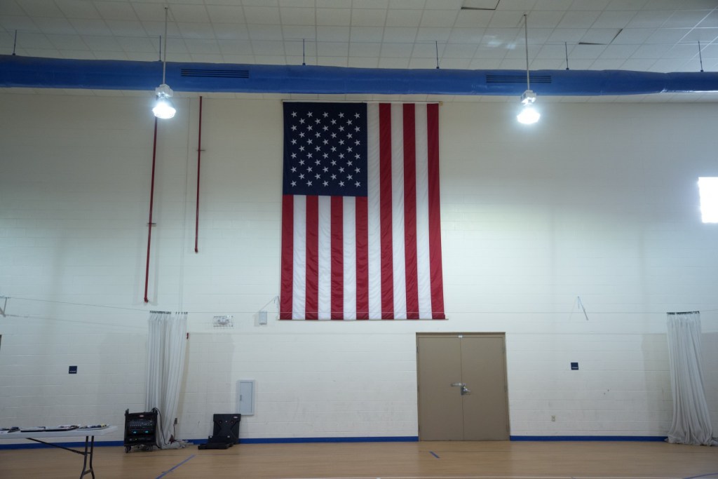 American flag in a school gym
