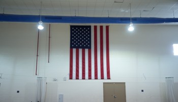 American flag in a school gym