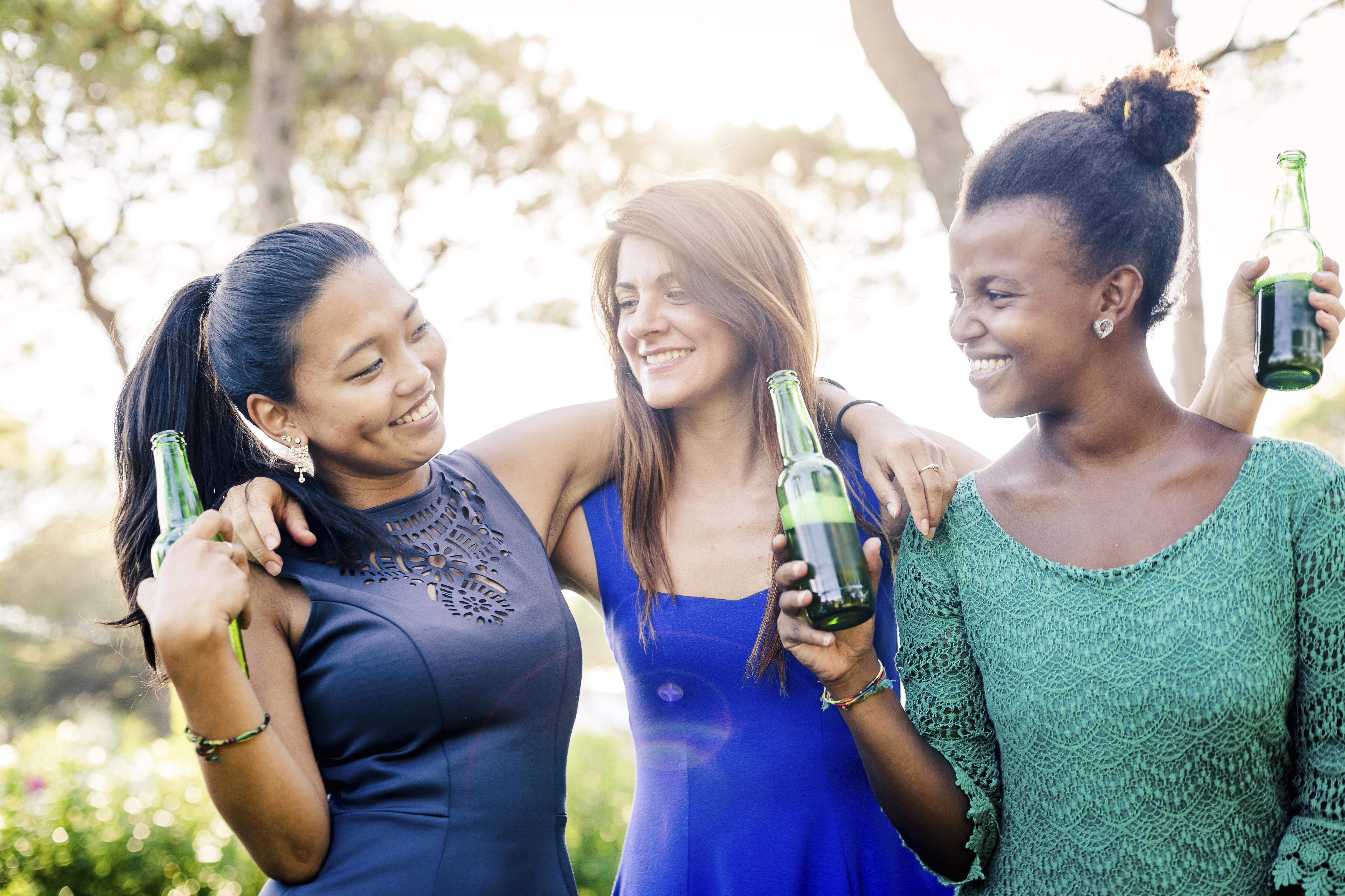 Three young women having fun at the park