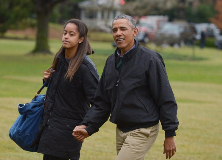 Malia & Dad On A Stroll