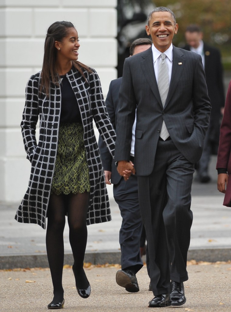 Malia Is Never Too Old To Hold Dad's Hand