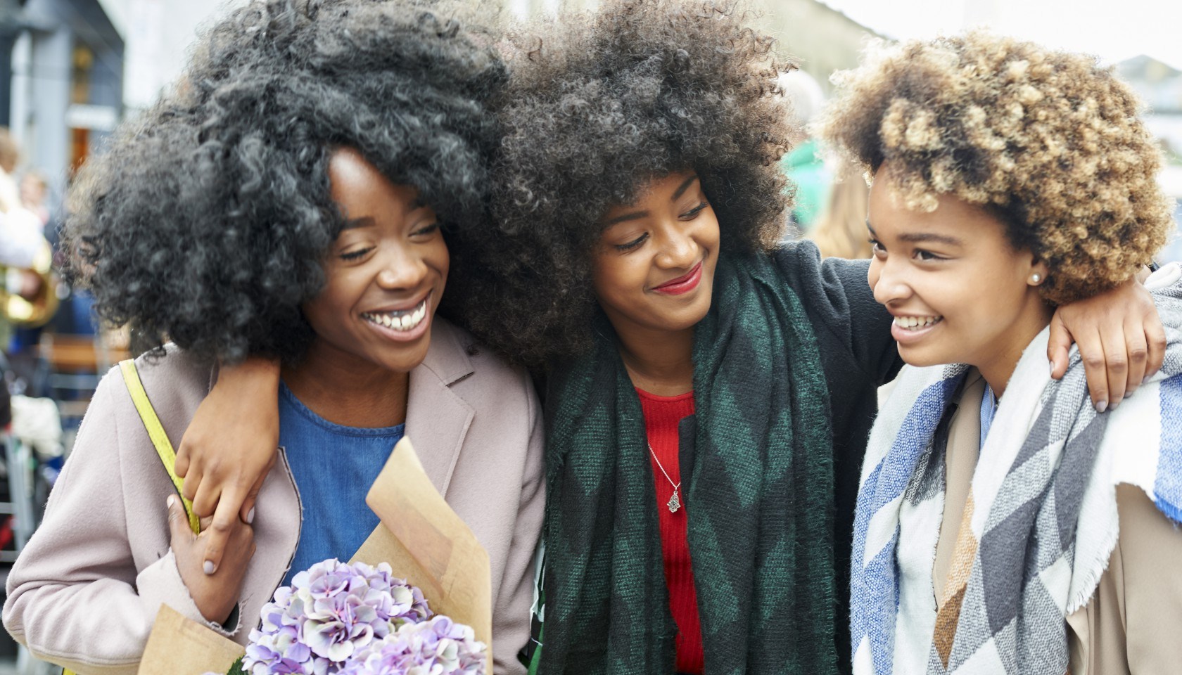 Friends shopping at a flower market.