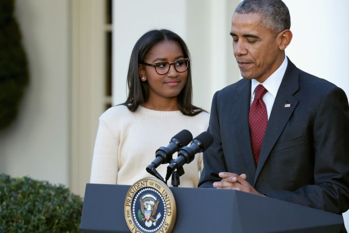 SASHA OBAMA AND HER FATHER AT THE TURKEY PARDON CEREMONY, 2015