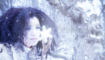 Snow Maiden With Crystal In A Winter Storm