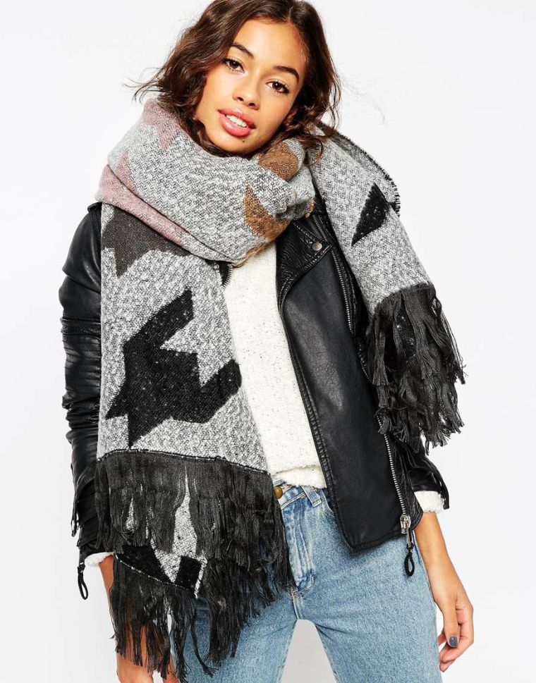 Throw on an oversized, printed scarf.