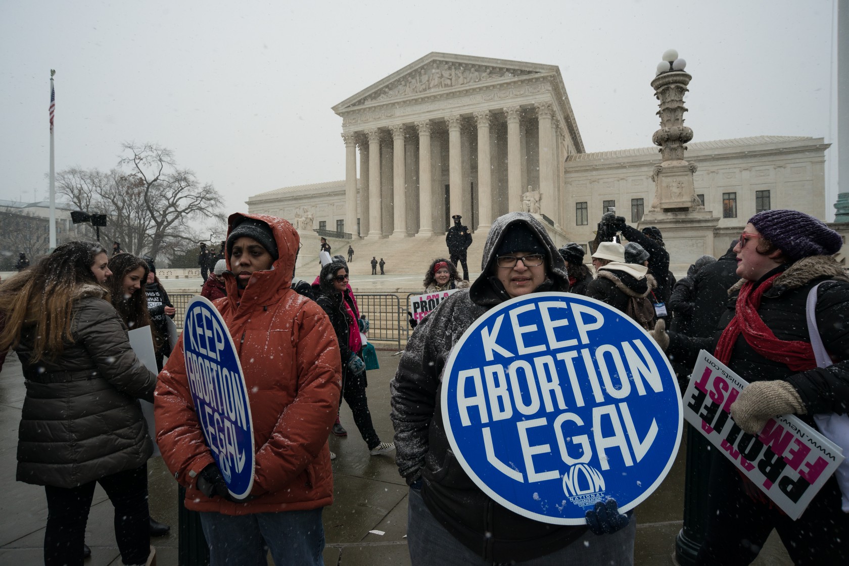 Pro-choice demonstrators stage a counter protest near the...