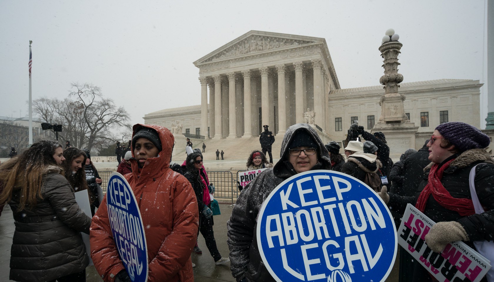 Pro-choice demonstrators stage a counter protest near the...