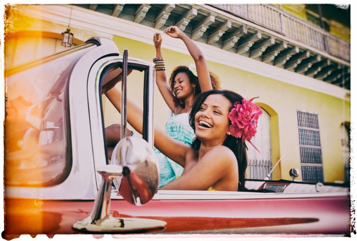 Two Young Caribbean Woman Traveling in Cuba
