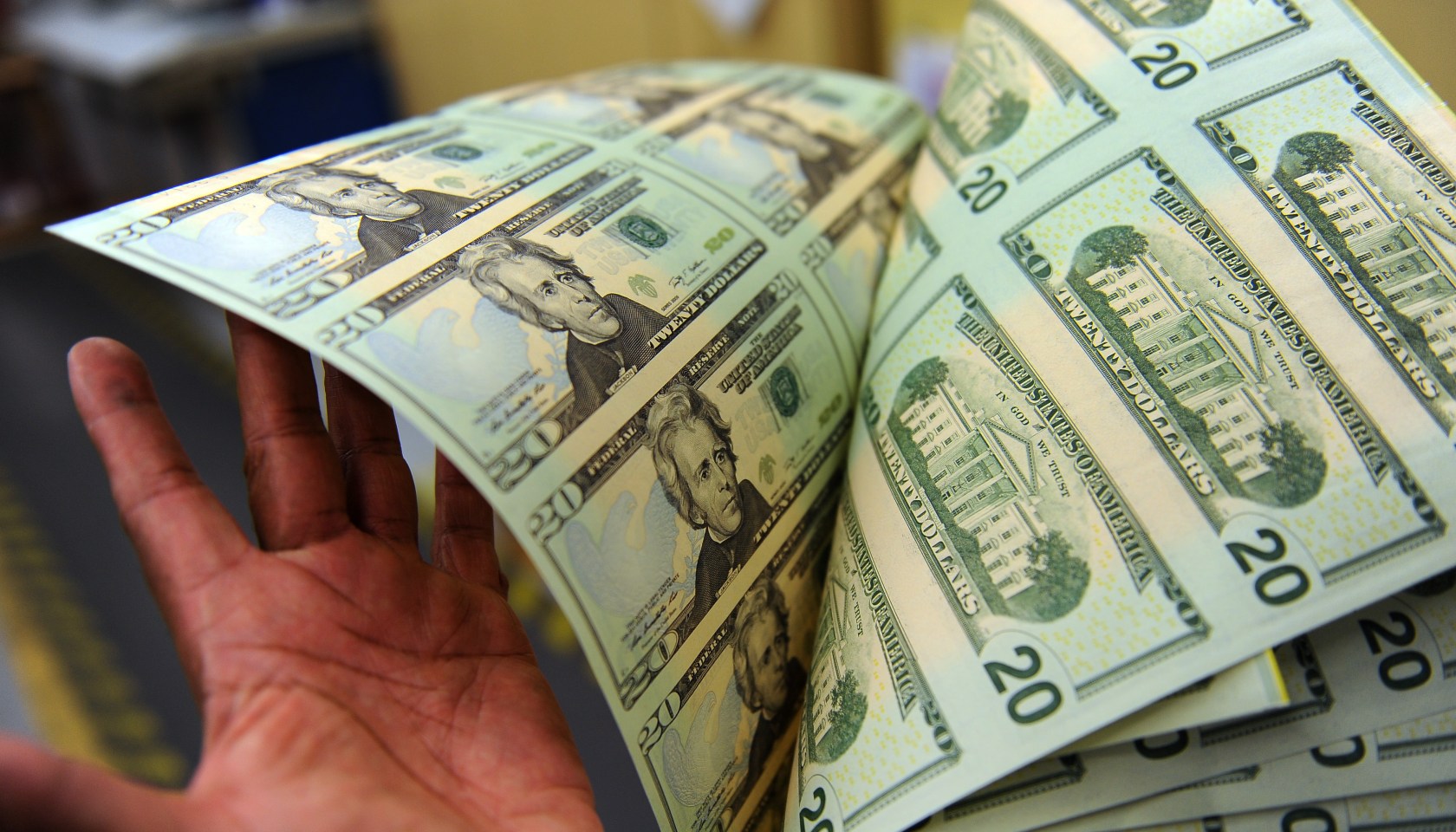 Bureau of Engraving and Printing making money.