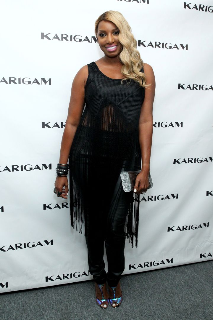 NeNe shows just a hint of skin in sexy black in 2016.