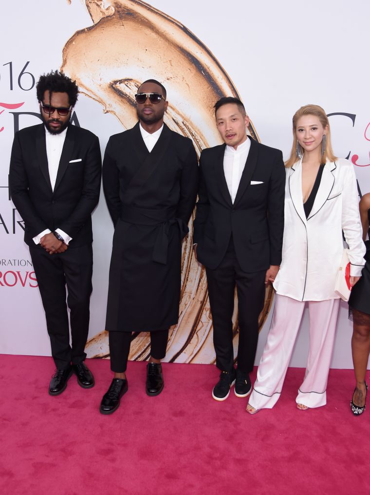 Dwyane Wade (2nd L) with Maxwell Osborne and Dao-Yi Chow of Public School