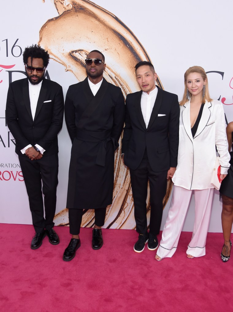Dwyane Wade (2nd L) with Maxwell Osborne and Dao-Yi Chow of Public School