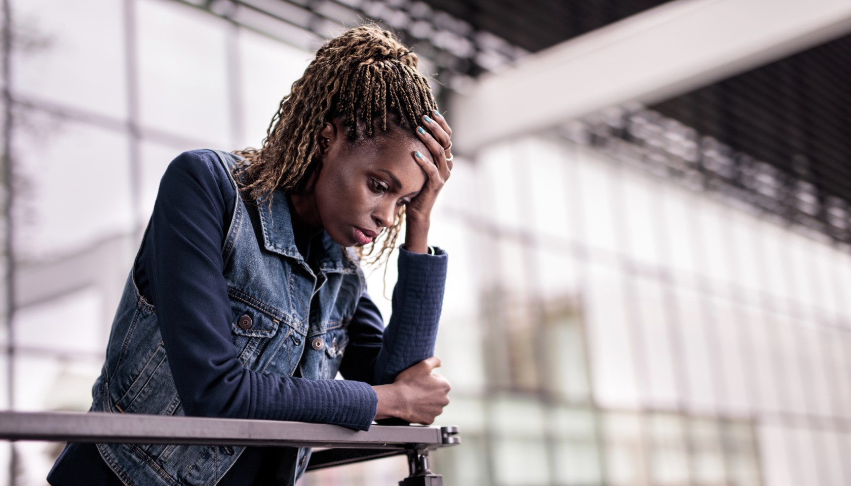 Worried African American businesswoman having some problems.