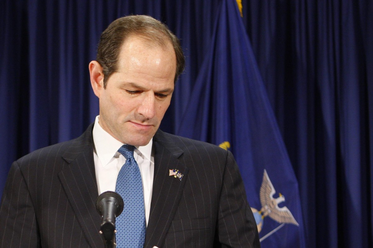 Eliot Spitzer, New York governor, flanked by his wife Silda