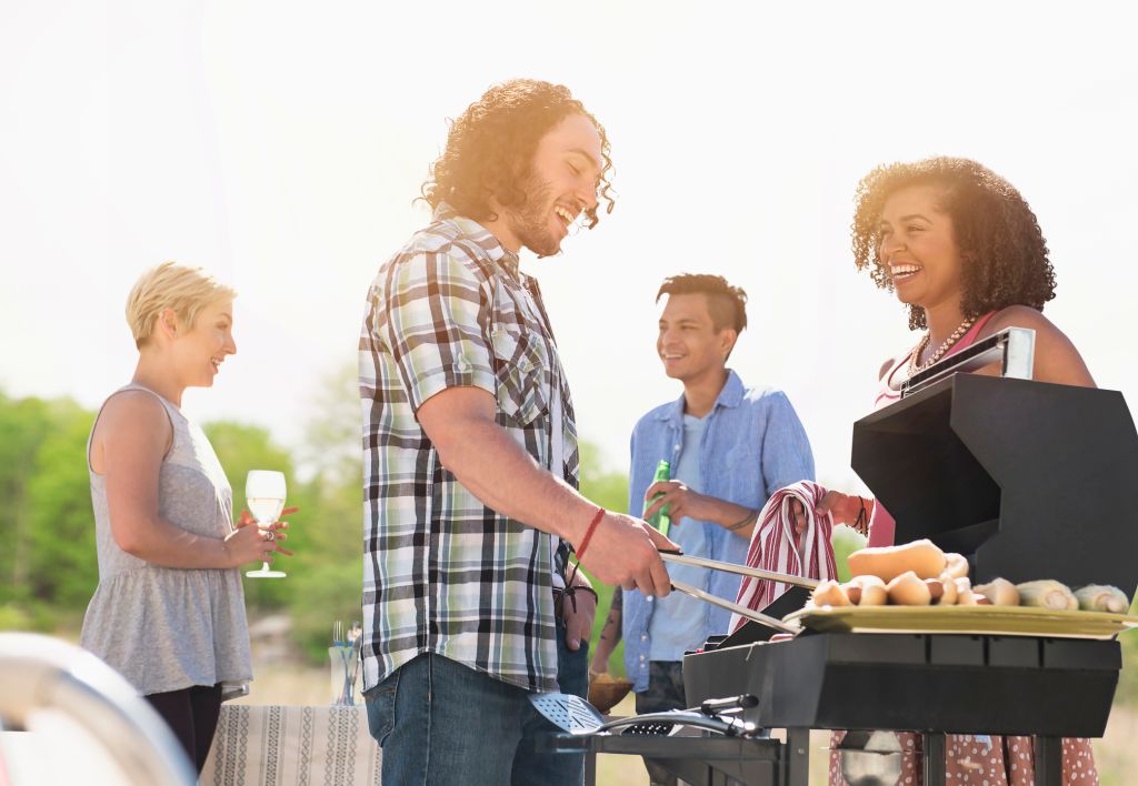 Friends talking at barbecue