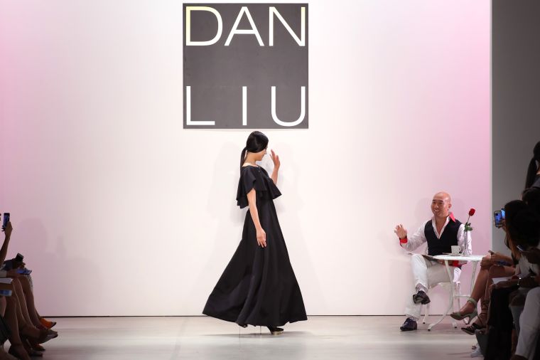 DAN LIU WAVES TO MODEL