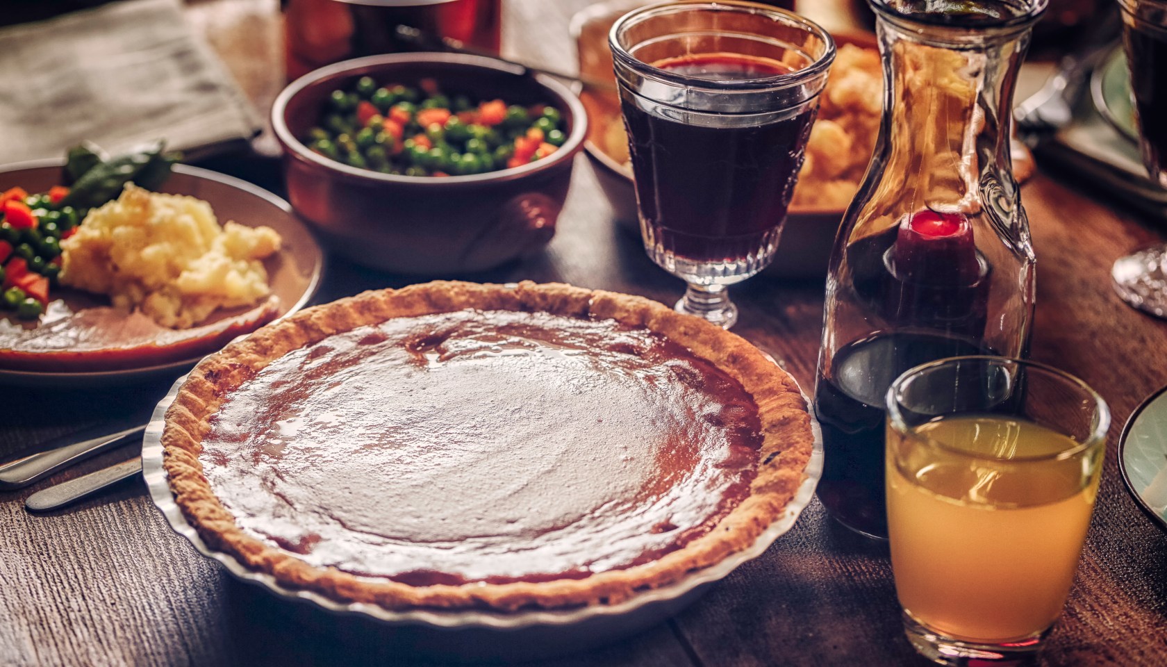 Traditional Stuffed Turkey Holiday Dinner with Vegetables and Pumpkin Pie
