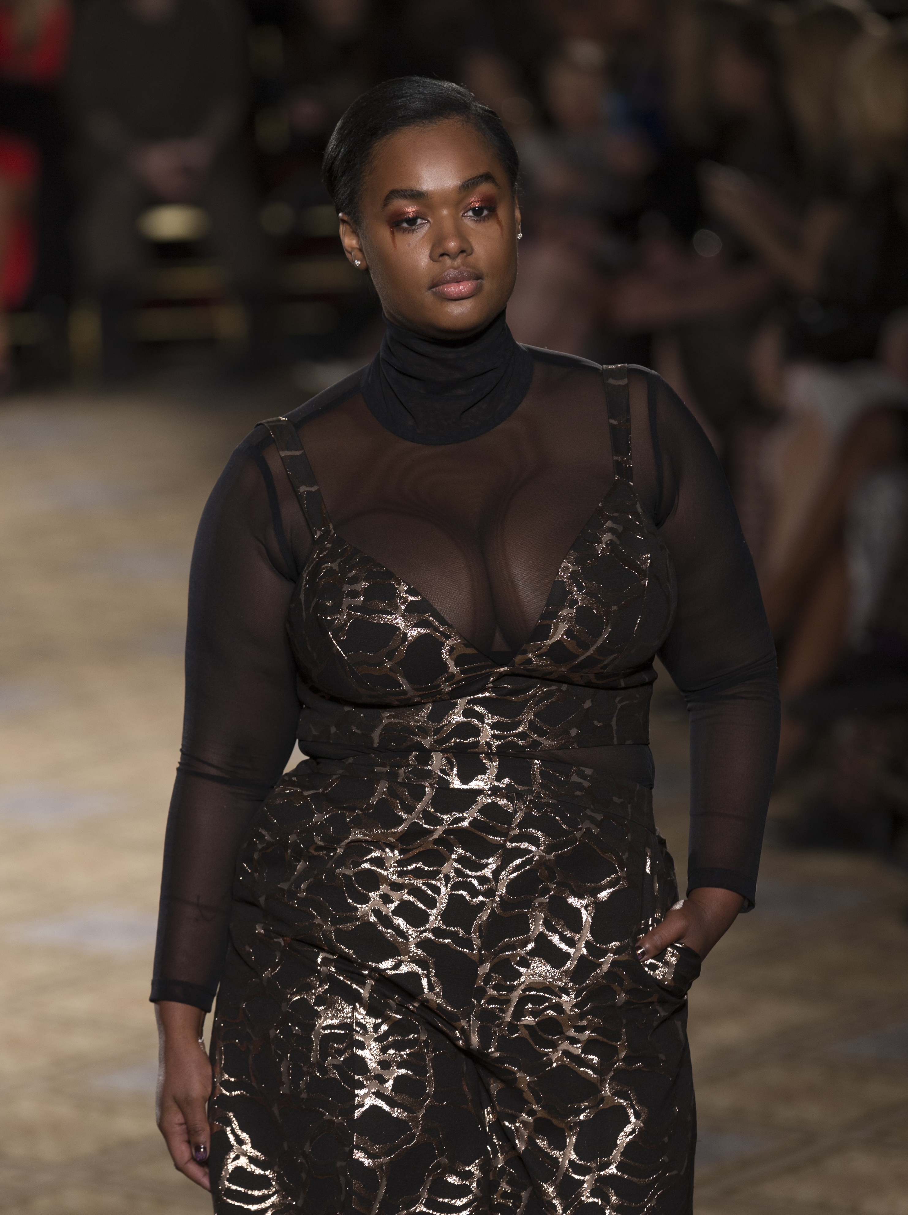 Model walks runway for Christina Siriano collection during...