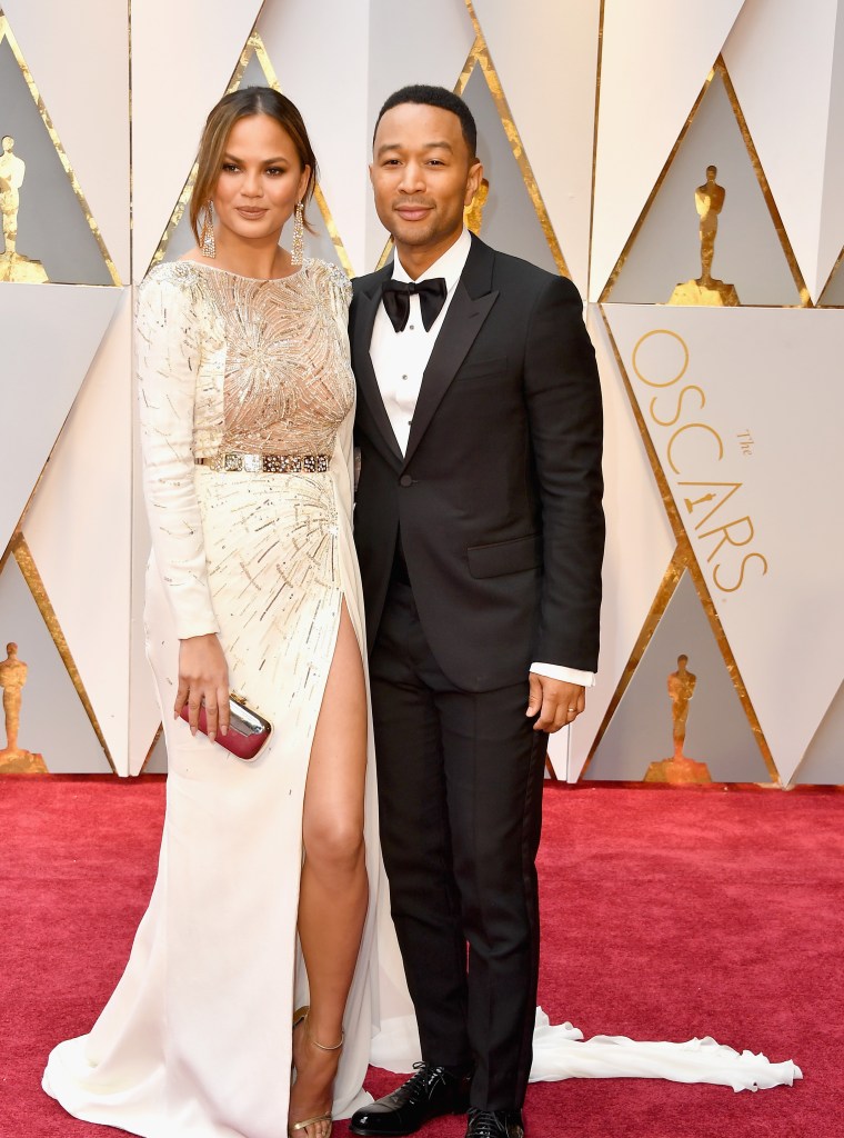 Chrissy Teigen In Zuhair Murad and John Legend in Gucci