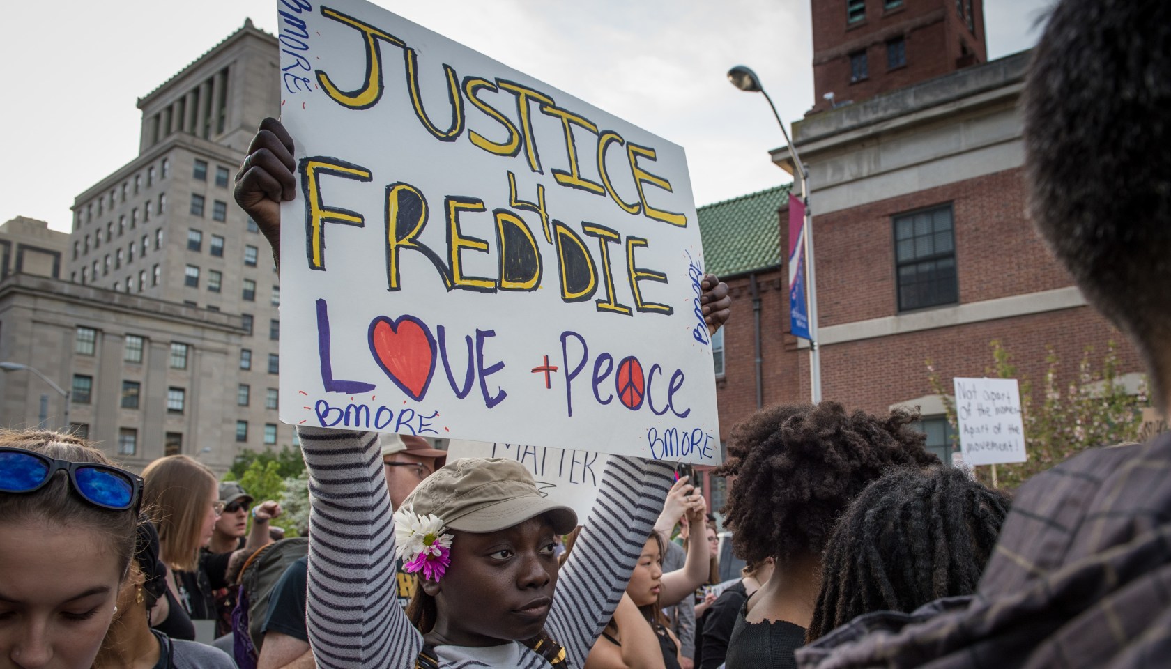 Tensions with Baltimore residents continue as protestors march in solidarity for Freddie Gray