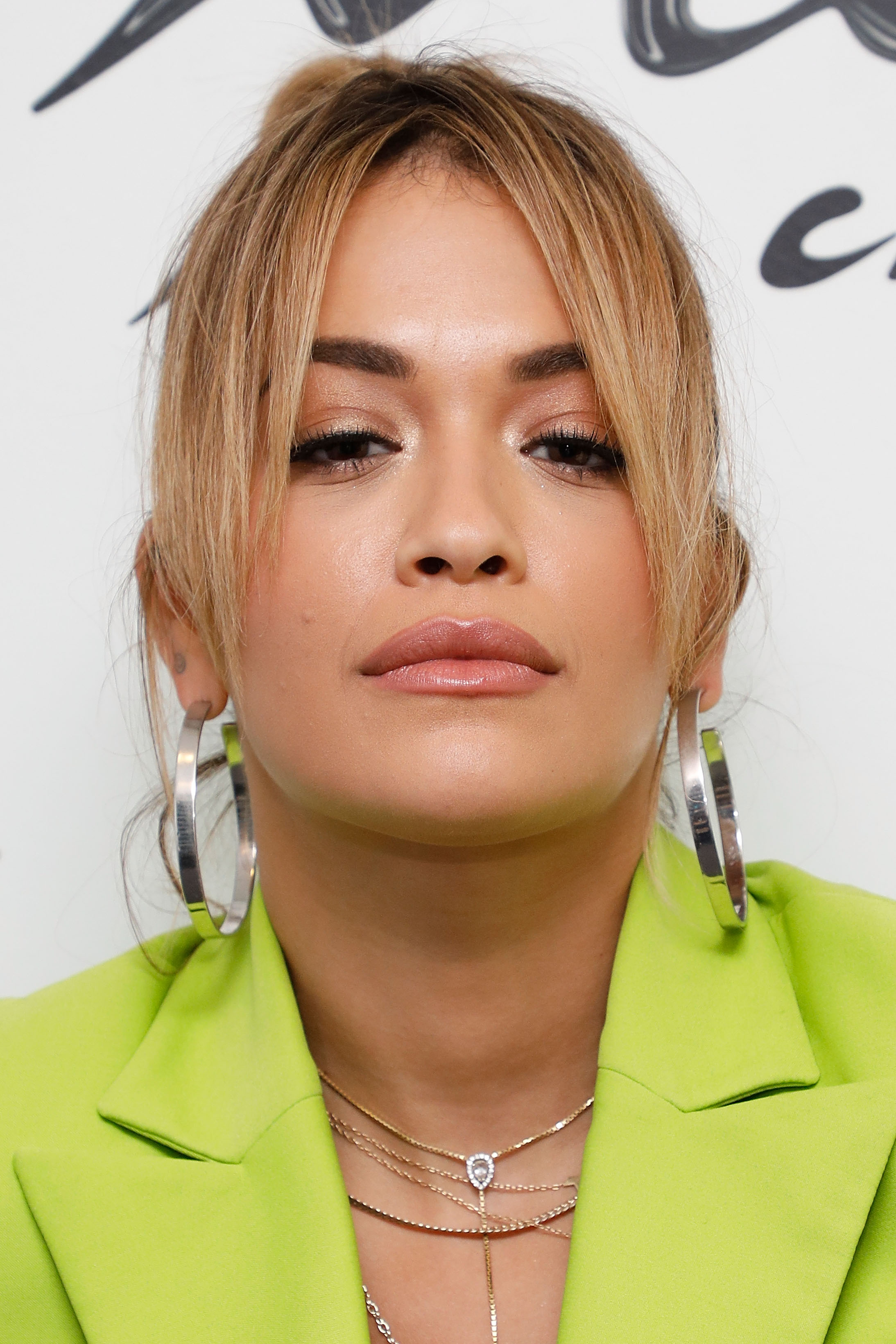 Rita Ora Shines In Lime - Vote On Her Look