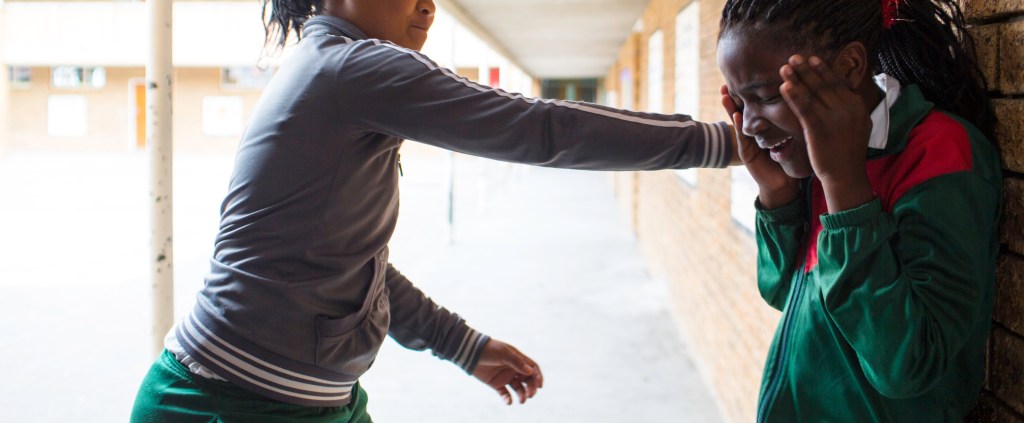 School girl bullies another girl