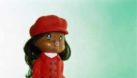Doll wearing red leisure suit