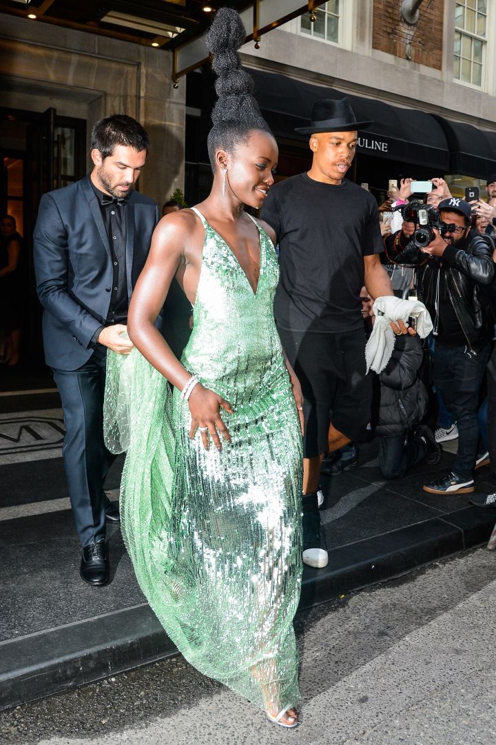 Lupita Nyong’o in a shimmery green dress