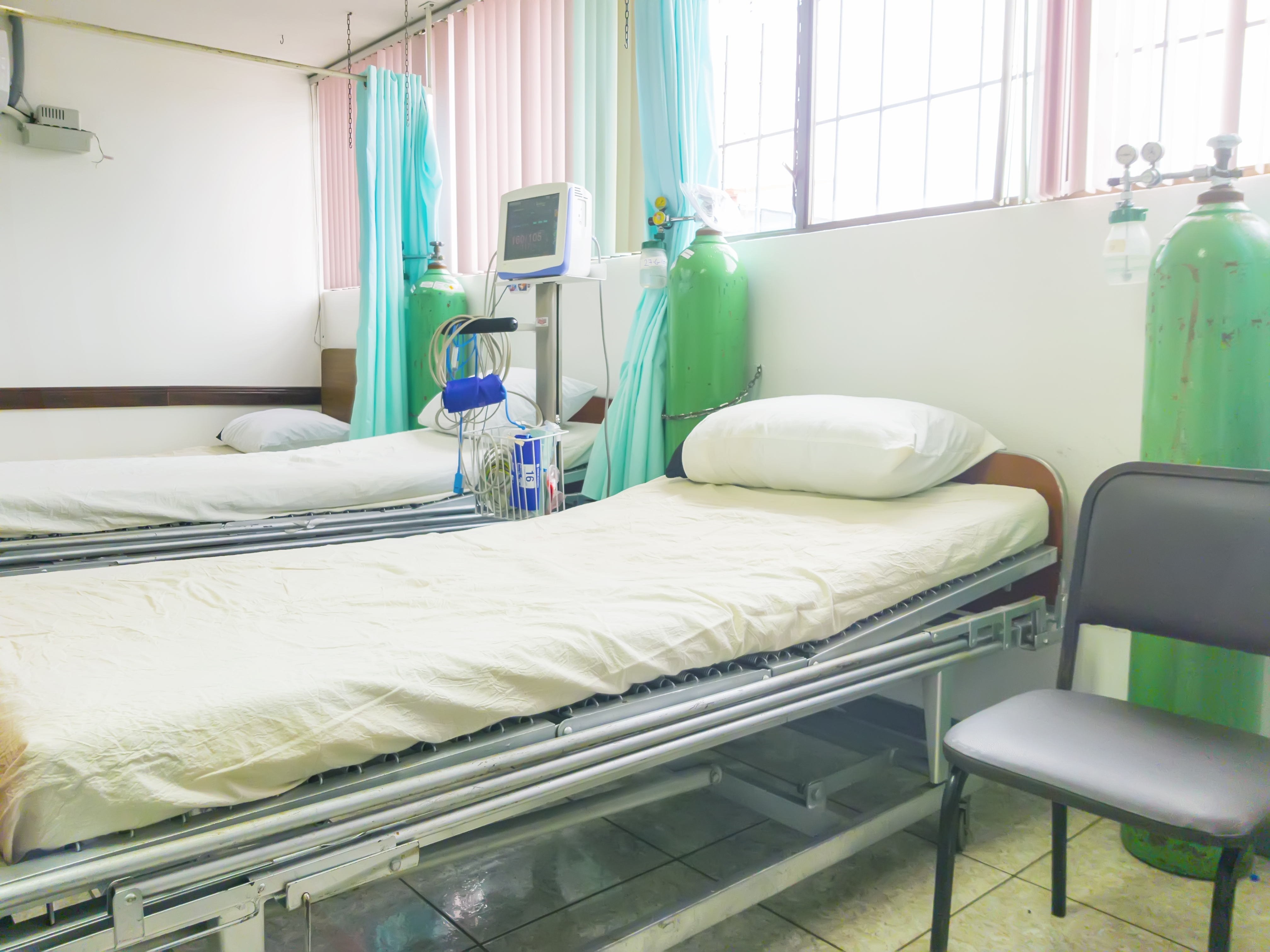 Empty beds in hospital room