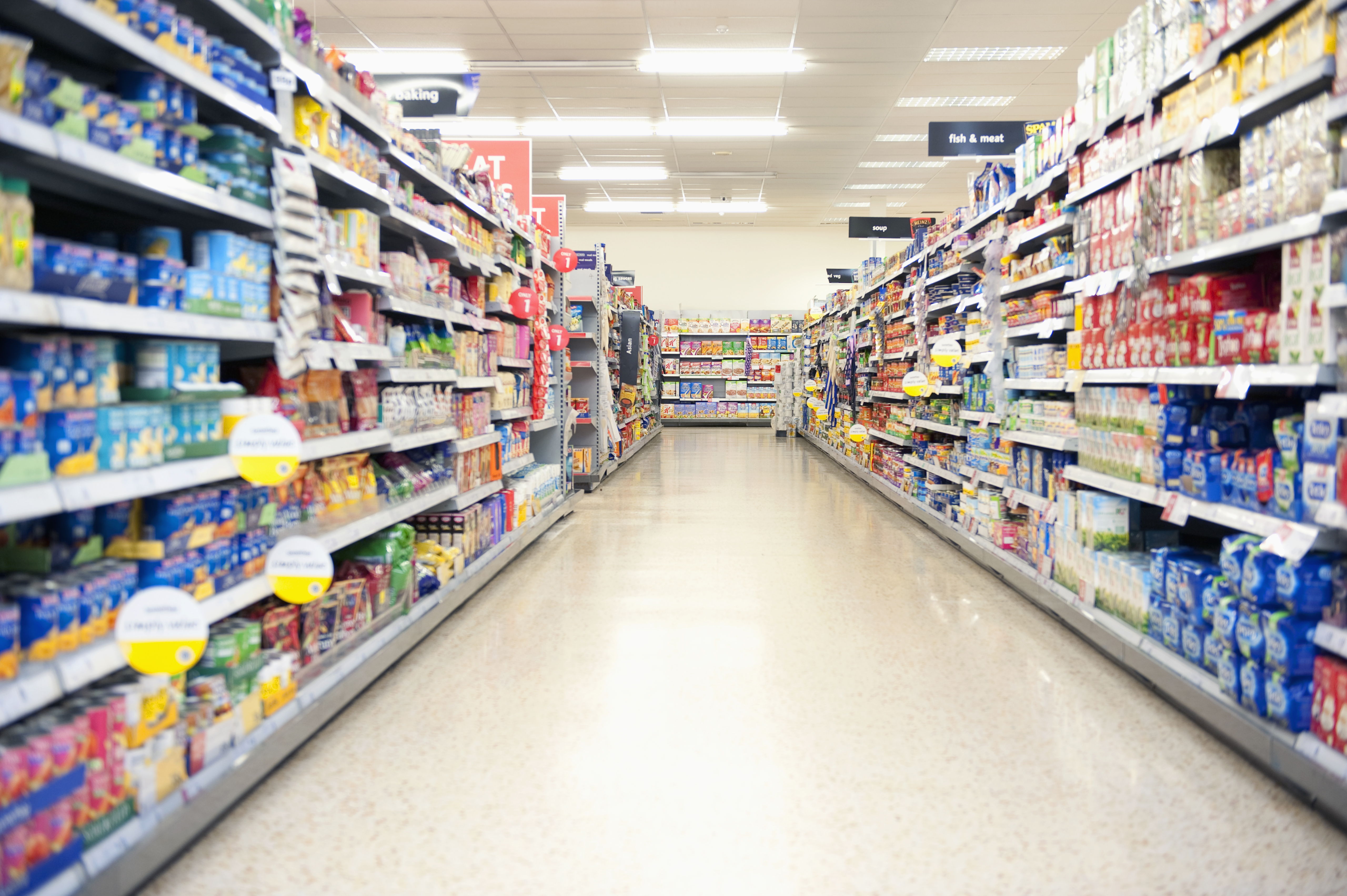 Shelves in grocery store aisle