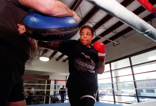 Boxer Freeda Foreman, daughter of former heaveyweight champion George Foreman, works out with her trainer Larry Goossen at America Presents Gym in Denver.