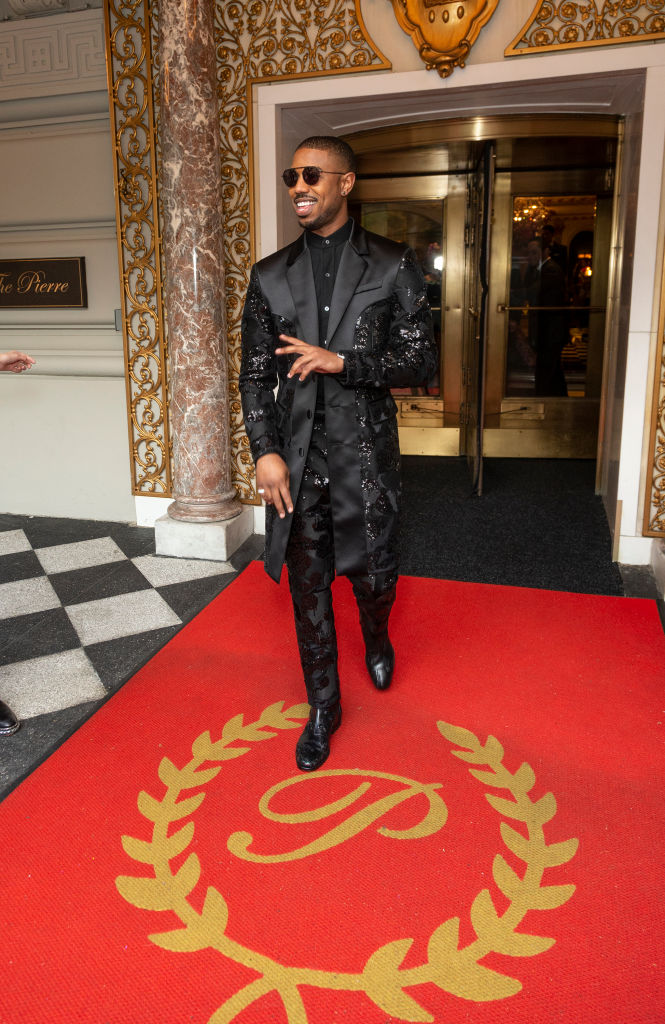 Michael B. Jordan wearing suit by Coach leaves The Pierre...